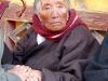 Elderly pilgrim at Drepung Monastery