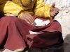 Monk reading pecha scriptures